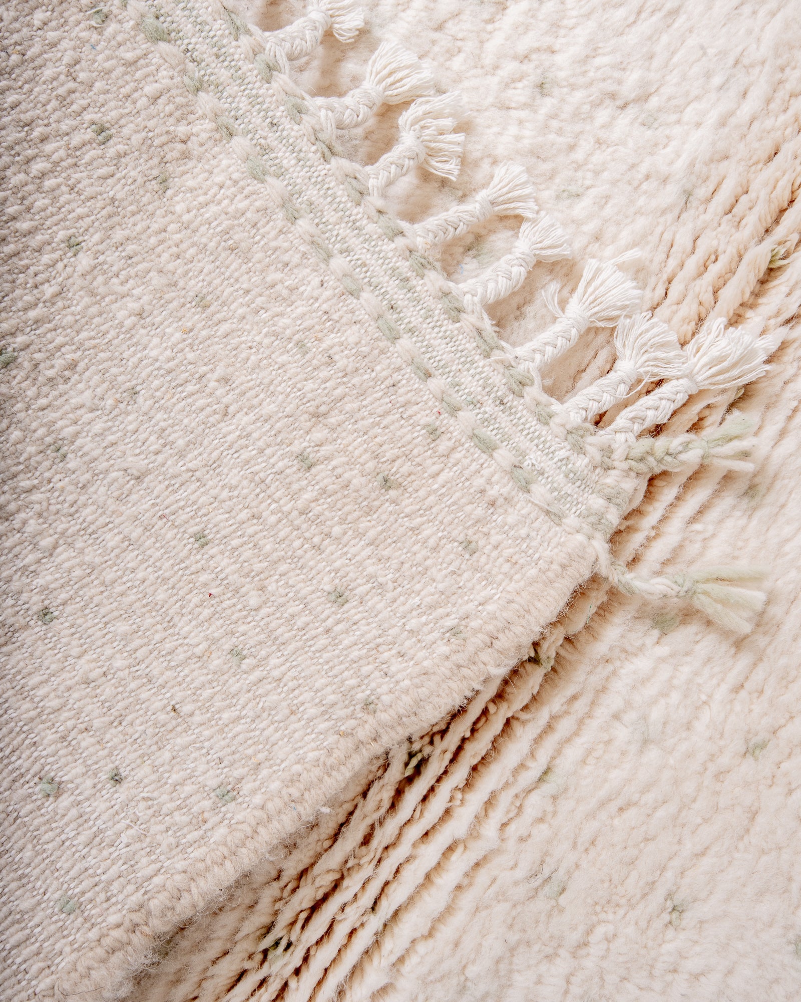 Modern, designer, handcrafted Berber rug from Morocco. Beniourain carpet with beautiful colours and patterns and fluffy wool texture.